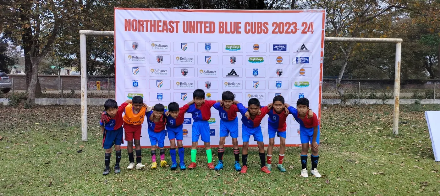 Youth football team standing together before a game